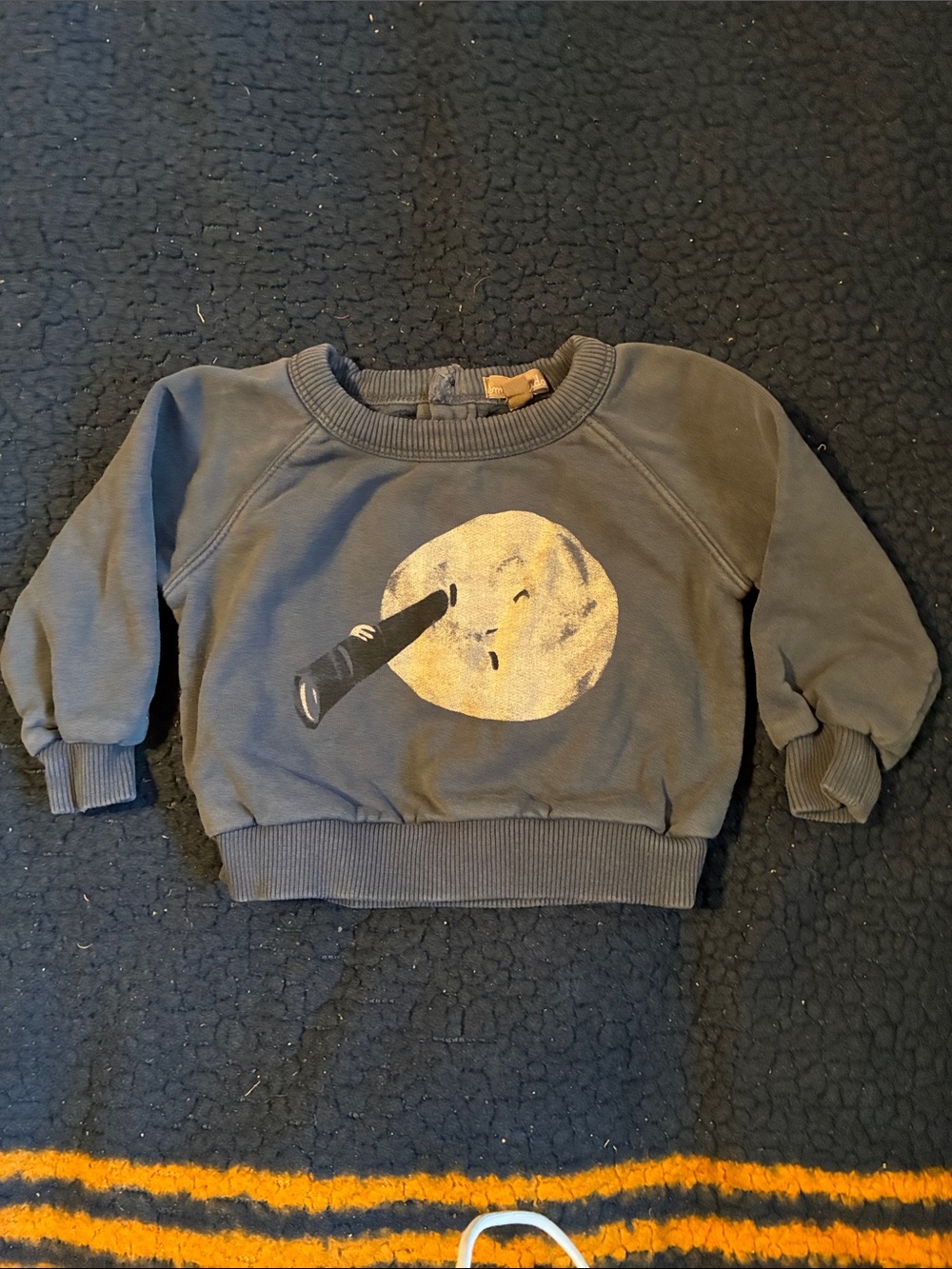ÉMILE ET IDA sweatshirt featuring a whimsical moon graphic in a light blue color